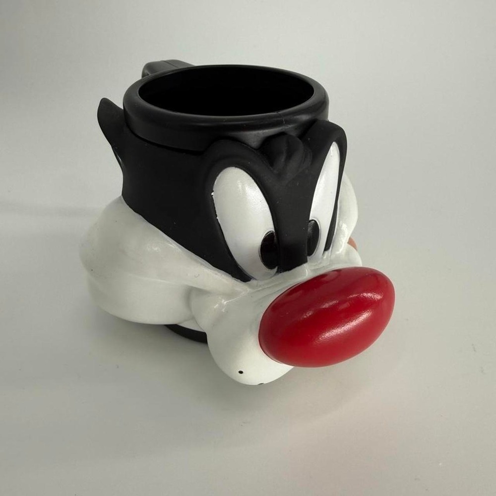 Looney Tunes Sylvester the Cat mug with red nose and black-and-white face